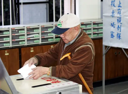 Individual casts ballot for legislative elections in Taipei